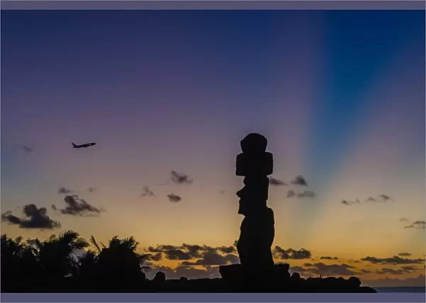 Plane and sunset over Easter Island