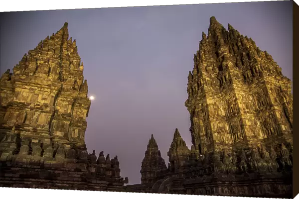 Moon over Prambanan Temple at night