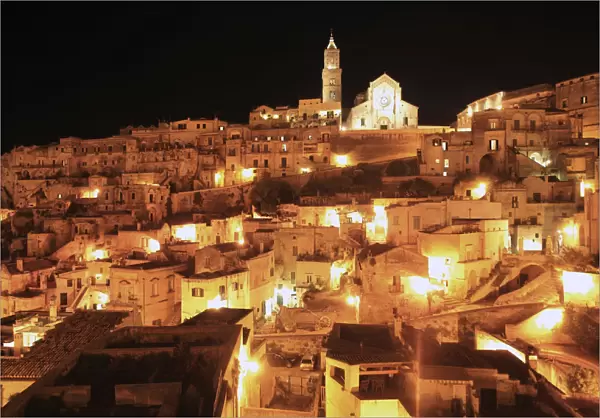 Old town of Sassi di Matera, consisting partly of cave dwellings, at night, Matera, Basilicata, Italy