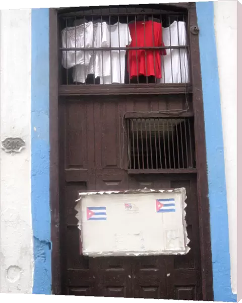 Doorway with laundry, Havana, Cuba