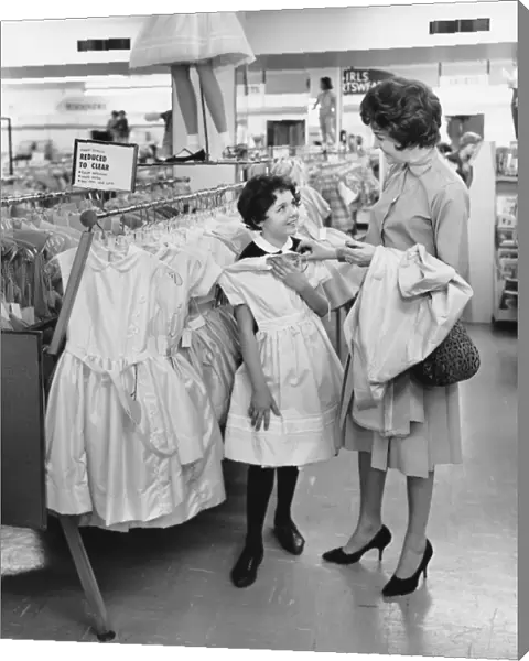 Mother and daughter shopping for clothes