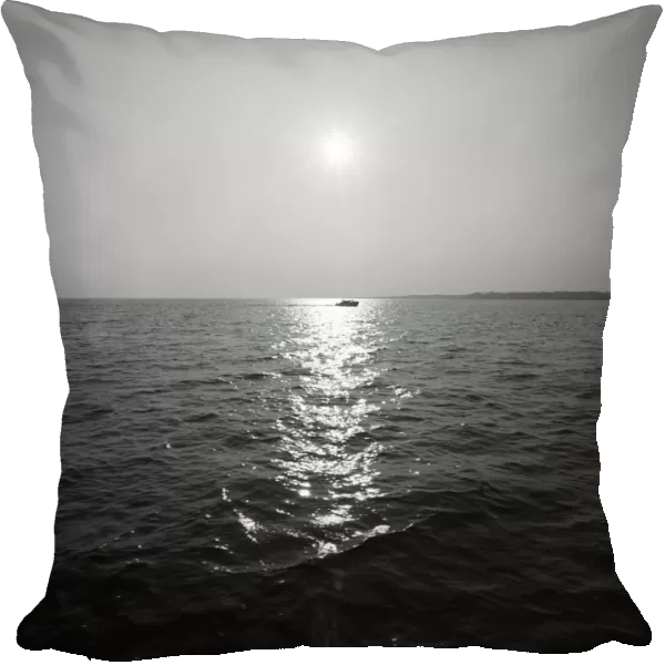Distant boat on ocean