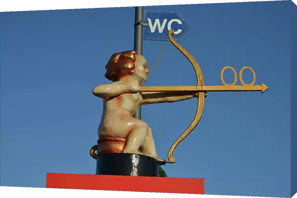 Archer Cupid as a toilet sign, Oktoberfest, Munich, Upper Bavaria, Bavaria, Germany