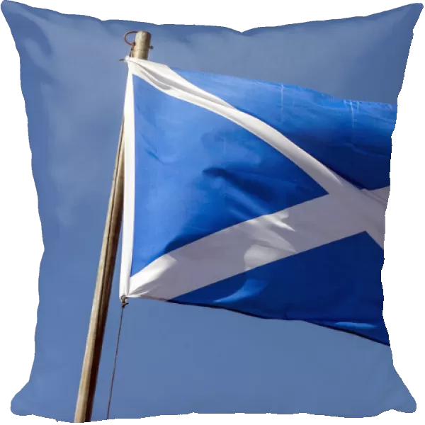 The Saltire, Scottish flag, flying against a blue sky, Oban, Scotland, United Kingdom