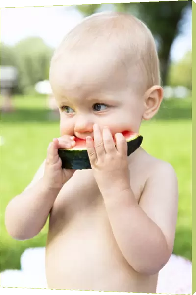 Baby, 12-14 months, eating watermelon