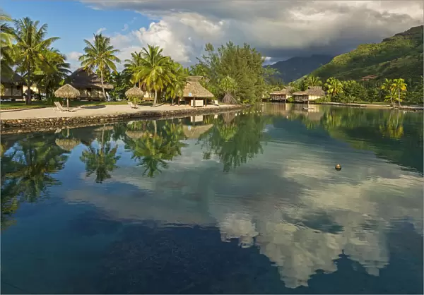 Overwater bungalows, evening atmosphere, Moorea, French Polynesia