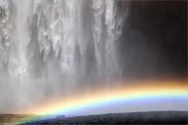 Waterfall with a rainbow, Skogafoss, Iceland