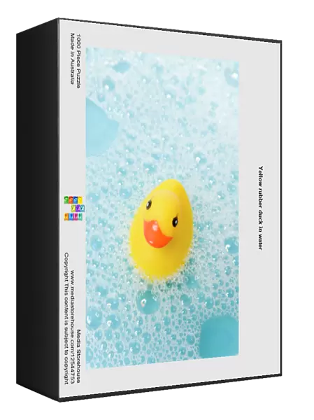 Yellow rubber duck in water