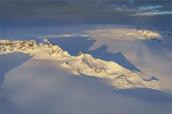 Aerial view of mountains and cliffs on a glacier, Iceland