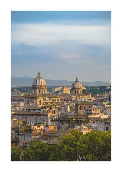 View of the old town and cupolas at sunset. Rome, Italy