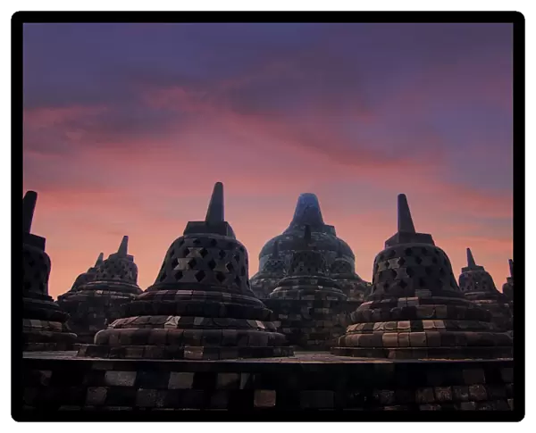 Stupas with dawn sky background