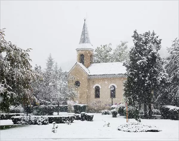 Church in Brasov during heavy snow, Romania