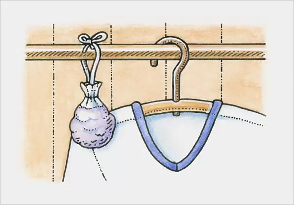 Sachet of lavender hanging on clothes rail in wardrobe, next to a shirt