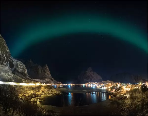 The aurora belt over Lofoten fishing village, Norway