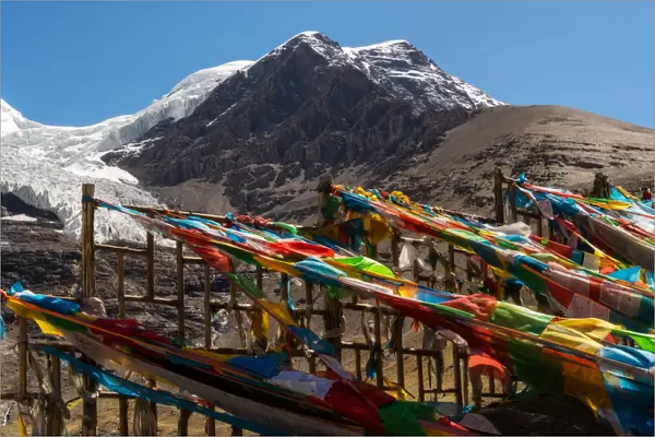 Tibetan Prayer Flag and big snowy mountain in background