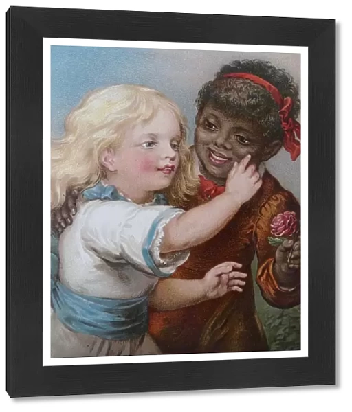 Blond girl touching the skin of a black african girl