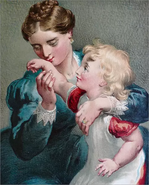 Mother kissing a place on the arm of daugther to make the injury well again
