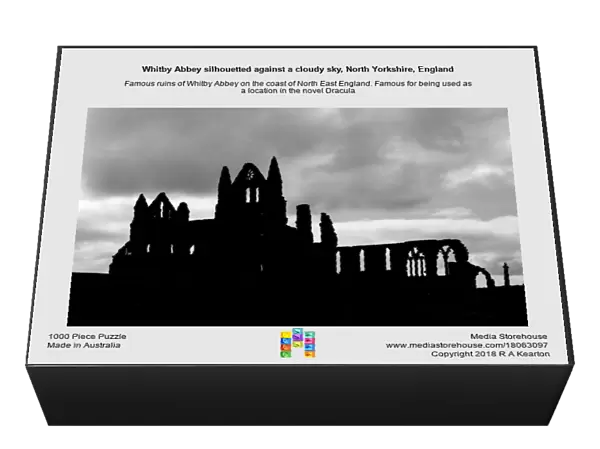 Whitby Abbey silhouetted against a cloudy sky, North Yorkshire, England
