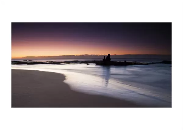 Peaceful ocean landscape photo at first light on the coastline of Durban, Kwazulu-Natal, South Africa