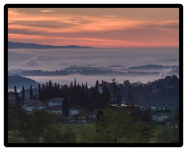 Sunrise over mist, Tuscany, Italy