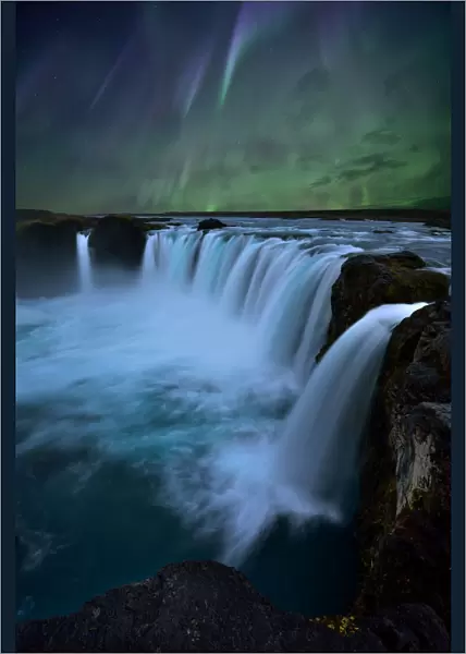 Northern Lights at Godafoss Waterfall in Iceland
