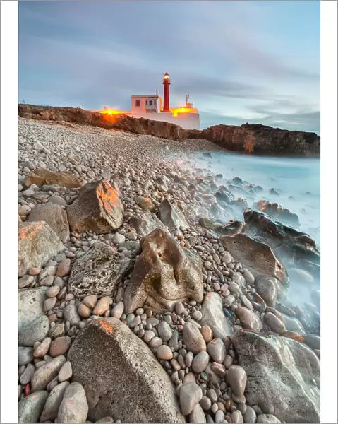 Light. Cabo Raso lighthouse and fort of Saint Bras near Guincho beach in Cascais area