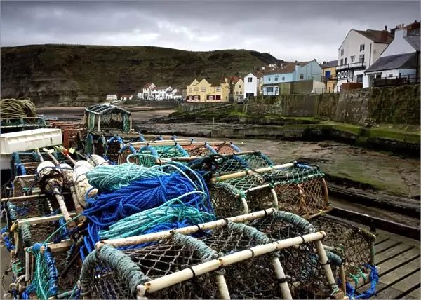Staithes, Yorkshire, England; Fishing supplies on a dock