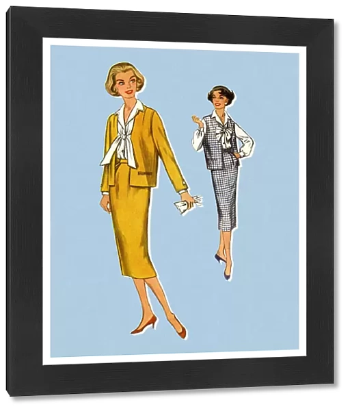 Two Women Wearing Suits