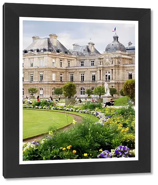 Jardin du Luxembourg, Paris with blooming flowers in foreground