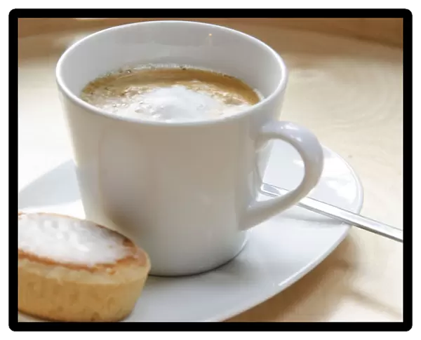 Cup of cappuccino with mazarin, almond tart credit: Marie-Louise Avery  /  thePictureKitchen