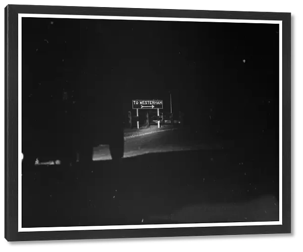 Westerham road sign, as seen at night. 1936