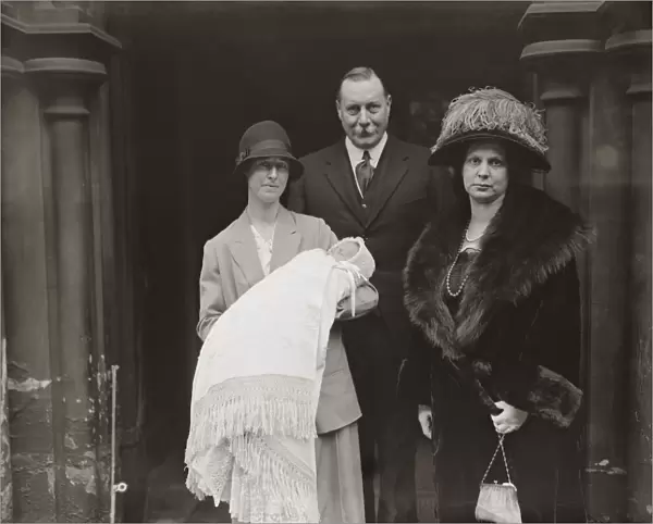 Lieutenant General Sir Travers Clarke and Lady Clarke ( with baby ) at the Christening