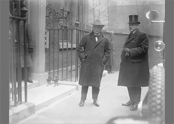The Premiers return. Mr Lloyd George with Mr McCurdy photographed outside no
