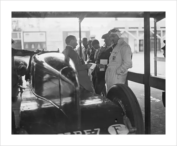 The British Empire Trophy Race. Three famous racing drivers chatting together in
