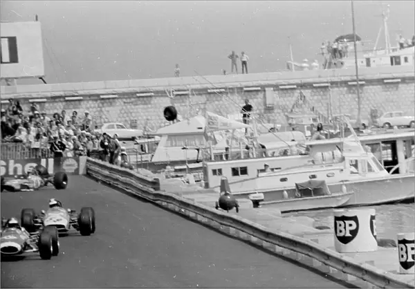 Monaco: Swiss driver Bernard Bauer (background left) loses wheel, seconds later car