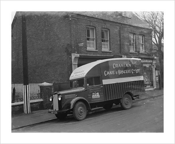 A Bedford van from the Crawley Cake and Biscuit Co Ltd from Crawley, Sussex, parked