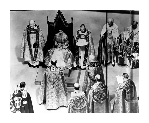 Coronation Day - The Queen dressed in the magnificent Royal Rose cloth of God receives