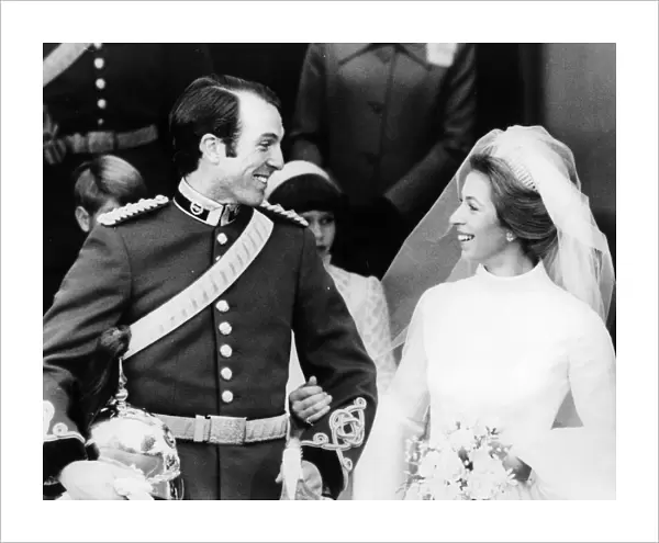 Princess Anne and Captain Mark Phillips as they walk out of Westminster Abbey after their wedding