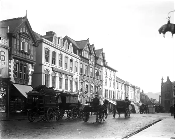 Horse drawn vehicles, Boscawen Street, Truro, Cornwall. Around 1910