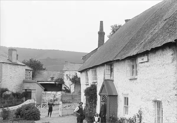 Thatched cottages at Bolingey, Perranzabuloe, Cornwall. Early 1900s