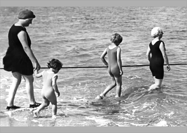 Family Swim Wearing One-Piece Suits