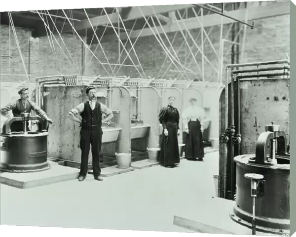 Boundary Street: interior of laundry room, people working with machinery, London