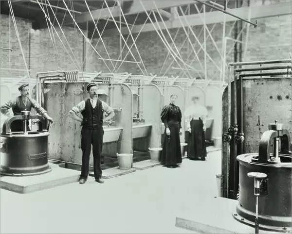 Boundary Street: interior of laundry room, people working with machinery, London