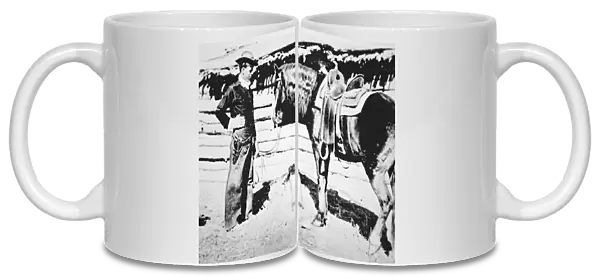 Butch Cassidy (1866-1908  /  09) with his horse (b  /  w photo)