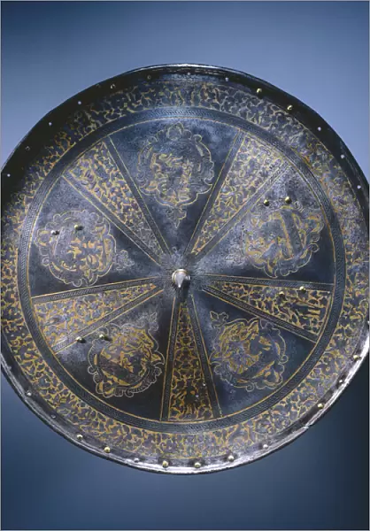Rondache, or round shield, c. 1570 (etched & gilded steel with brass rivets)