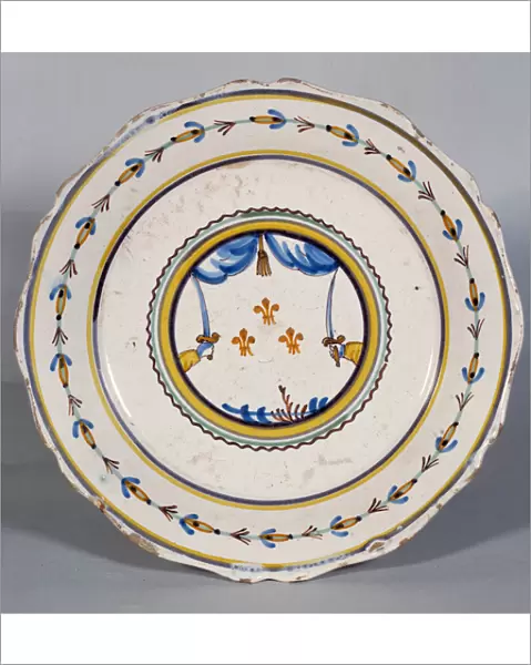 French Revolution: Plate flowers of lilies and sword. Ceramic of the 18th century