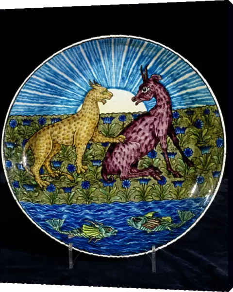 Charger with a leopard and a deer on the bank of a river, painted by Charles Passenger