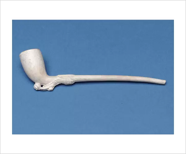 Small pipe with stem in shape of a ladys leg and boot (clay)
