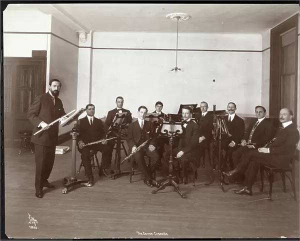 Men from the Barrere Ensemble Orchestra with wind instruments