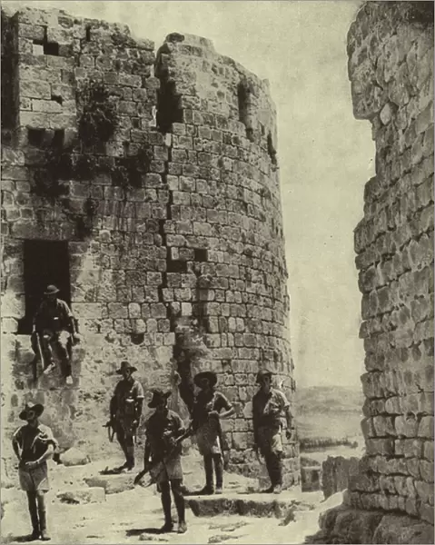 Australian soldiers searching for snipers in the ruins of the medieval Crusader castle in Sidon, Lebanon, after its capture from Vichy French forces, World War II, June 1941 (b  /  w photo)